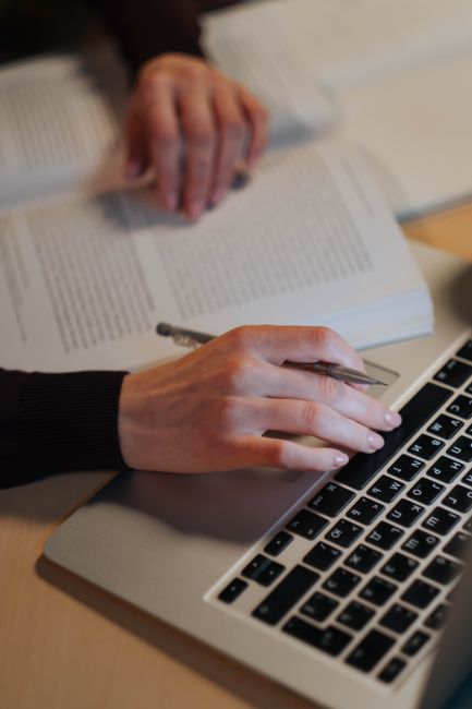 APA format generator interface on a research laptop with structured source fields