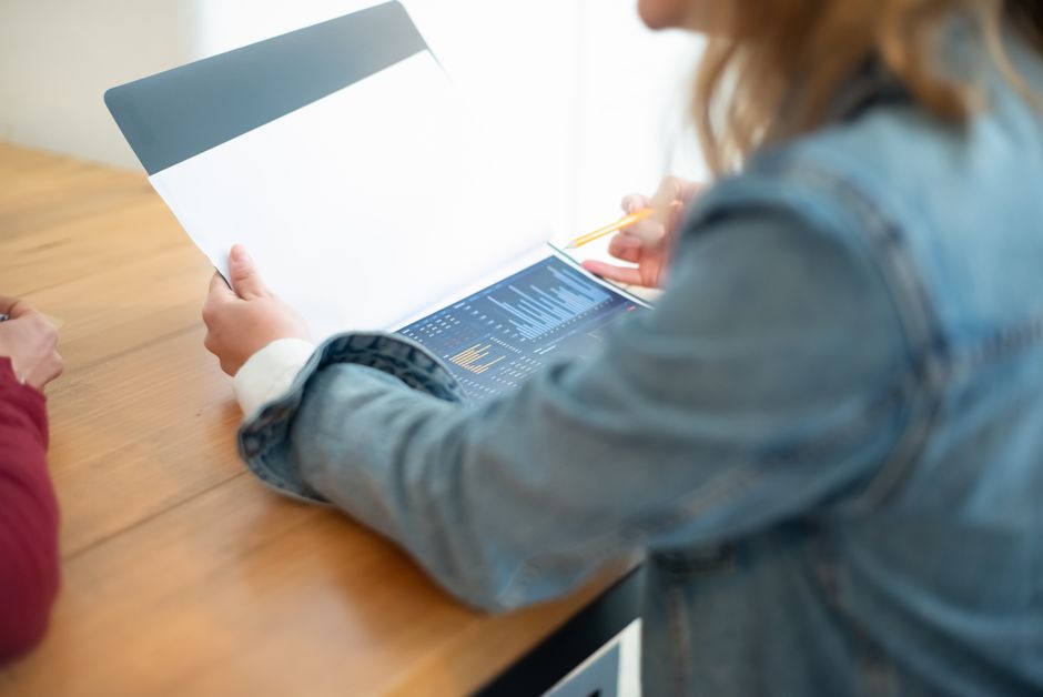 Content Audit Review Editorial team reviewing ai writer free content quality reports and search performance